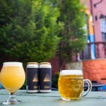 Beer on picnic table at Long Live Roxbury