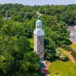 Isaac Sprague Memorial Clock Tower aerial view at Elm Park in Wellesley Hills in town of Wellesley, Massachusetts MA, USA.