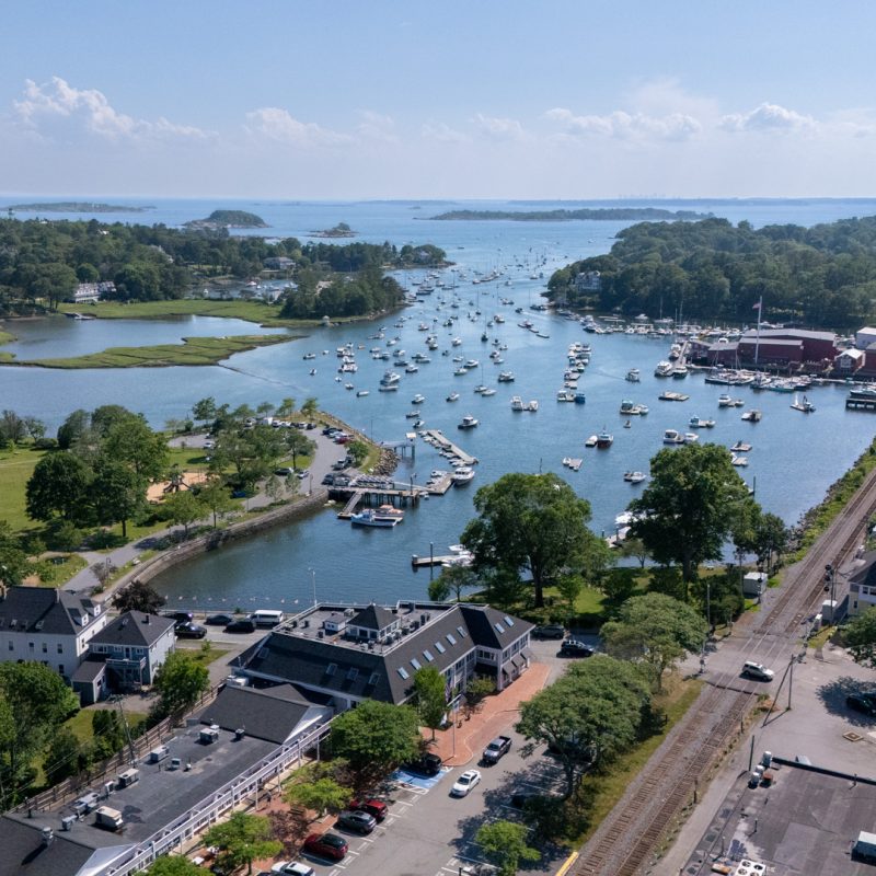 Manchester-by-the-Sea view of train tracks and coastline from the sky