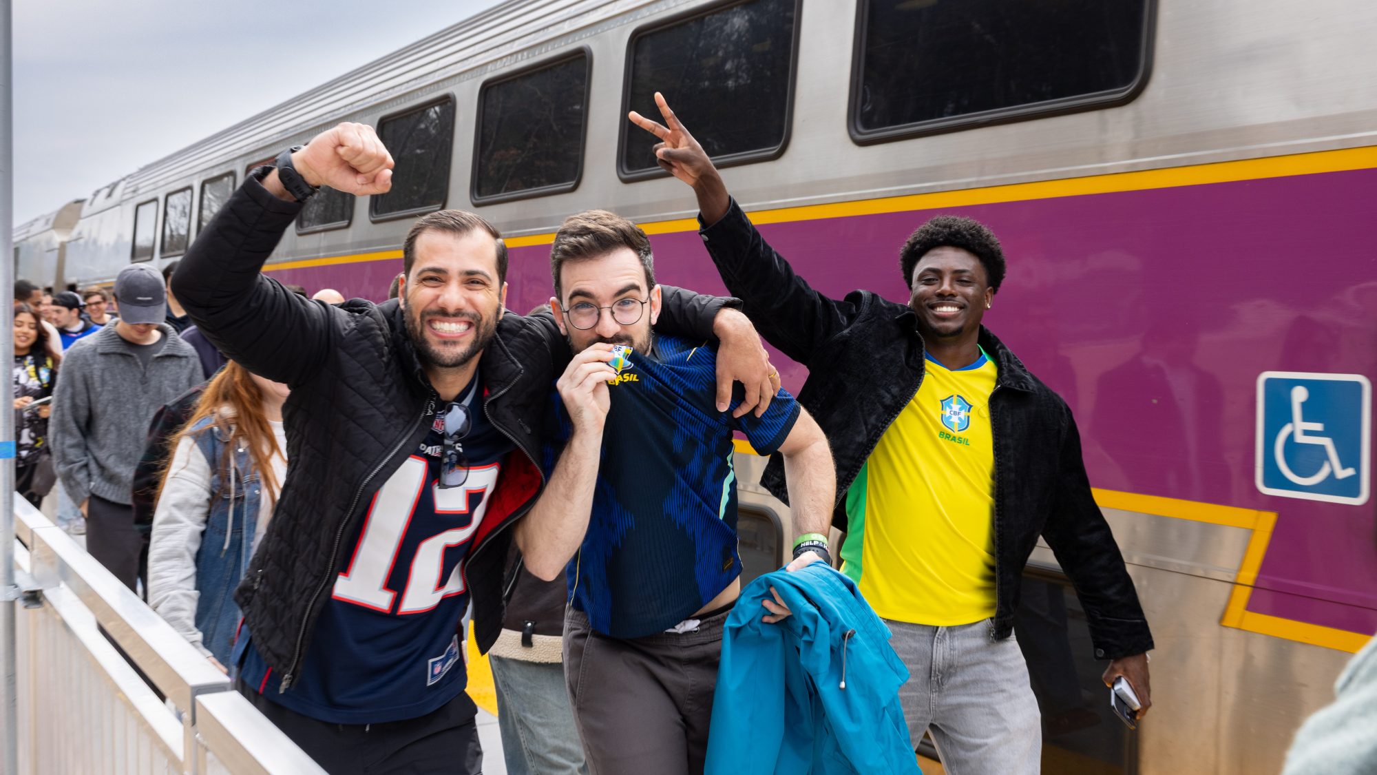 Soccer fans celebrating before entering the stadium to watch a match