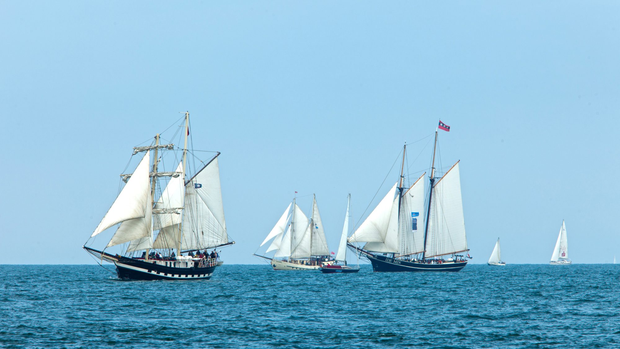 Tall Ships in the ocean preparing for their parade of sail